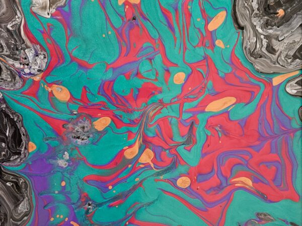 Vibrant abstract swirl of turquoise, red, purple, and black colors.