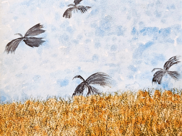 Painted black birds flying over golden field
